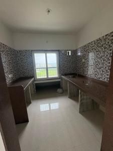 Kitchen Image of 700 Sq.ft 1 BHK Apartment / Flat for rent in Arihant Aspire, Panvel Navi Mumbai for Rs. 15000