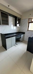 Kitchen Image of 1150 Sq.ft 2 BHK Apartment / Flat for rent in Vishesh Balaji Symphony, Shilottar Raichur Navi Mumbai for Rs. 25000
