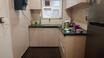 Kitchen Image of 650 Sq.ft 1 BHK Builder Floor for rent in Sector 14 Gurgaon for Rs. 29000