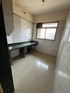 Kitchen Image of 700 Sq.ft 1 BHK Apartment / Flat for sale in Mohan Willows I, Badlapur East Badlapur for Rs. 2750000
