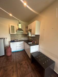 Kitchen Image of 1200 Sq.ft 1 BHK Builder Floor for rent in Greater Kailash New Delhi for Rs. 65000