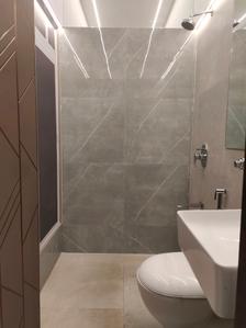 Common Bathroom Image of 450 Sq.ft 1 BHK Apartment / Flat for sale in Emerald Dotom Isle, Kandivali West Mumbai for Rs. 8900000