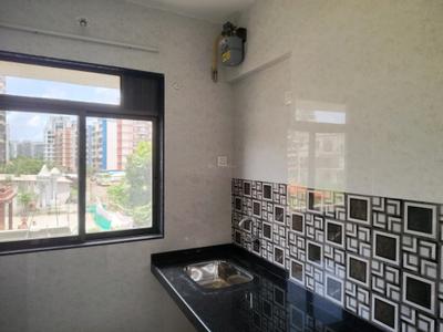 Kitchen Image of 600 Sq.ft 1 BHK Apartment / Flat for rent in Raunak Heights, Kasarvadavali Thane for Rs. 16000