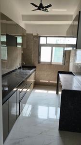 Kitchen Image of 750 Sq.ft 2 BHK Apartment / Flat for rent in Laxmi Luxury CHSL LTD, Goregaon West Mumbai for Rs. 65000