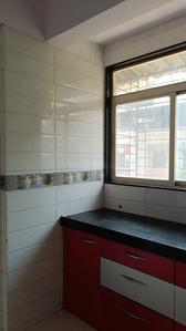 Kitchen Image of 550 Sq.ft 1 BHK Apartment / Flat for rent in Seawoods Navi Mumbai for Rs. 32000