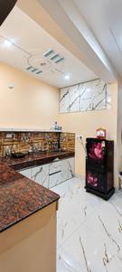 Kitchen Image of Anya Girl's PG  in Bhitauli, Lucknow