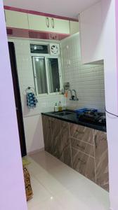 Kitchen Image of 450 Sq.ft 1 BHK Apartment / Flat for rent in APAK Ajinkya Towers, Charholi Budruk Pune for Rs. 16500