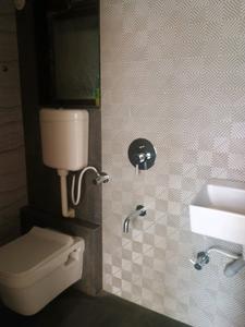 Common Bathroom Image of 720 Sq.ft 1 BHK Apartment / Flat for sale in Krishna Ultima, Kalyan East Kalyan for Rs. 4400000
