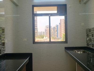 Kitchen Image of 600 Sq.ft 1 BHK Apartment / Flat for sale in Tharwani Vedant Nakshatra, Badlapur West Badlapur for Rs. 2900000
