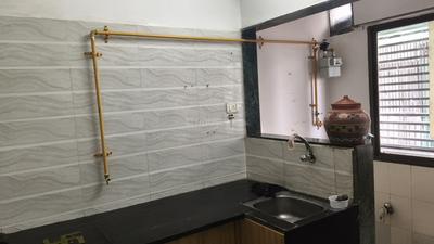 Kitchen Image of 700 Sq.ft 2 BHK Apartment / Flat for rent in Signature Homes, Sarkhej Ahmedabad for Rs. 17000