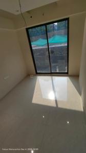 Bedroom Image of 614 Sq.ft 1 BHK Apartment / Flat for sale in Om Swayambhu Siddhivinayak Balaji Residency 2, Thakurli Thane for Rs. 4580000