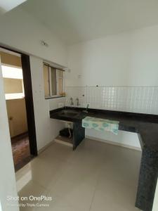 Kitchen Image of 880 Sq.ft 1.5 BHK Apartment / Flat for sale in Amit Colori, Undri Pune for Rs. 3900000