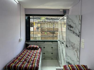 Bedroom Image of Rassiwala PG Churchgate in Churchgate, Mumbai