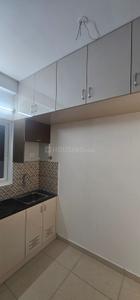 Kitchen Image of 800 Sq.ft 2 BHK Apartment / Flat for rent in Urbanrise Revolution One, Padur Chennai for Rs. 26000