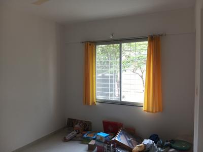 Bedroom Image of 650 Sq.ft 2 BHK Apartment / Flat for rent in Charholi Budruk Pune for Rs. 16000