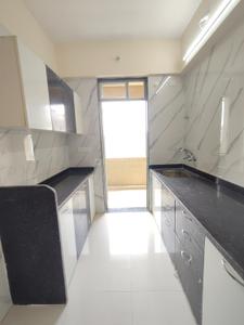 Kitchen Image of 730 Sq.ft 2 BHK Apartment / Flat for rent in Mohan Precious Greens, Ambernath East Ambernath for Rs. 20000