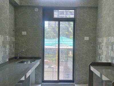 Kitchen Image of 710 Sq.ft 1 BHK Apartment / Flat for sale in Queens Court, Kalyan West Kalyan for Rs. 5500000
