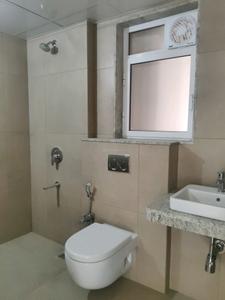Common Bathroom Image of 735 Sq.ft 2 BHK Apartment / Flat for sale in Nirmal City Of Joy, Mulund West Mumbai for Rs. 17800000