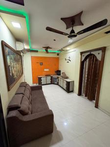 Living Room Image of 630 Sq.ft 2 BHK Apartment / Flat for rent in Dombivli West Thane for Rs. 18000