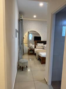 Bedroom Image of 620 Sq.ft 1.5 BHK Apartment / Flat for sale in AlamoXsreal Tuscany, Mahindra World City Chennai for Rs. 4200000
