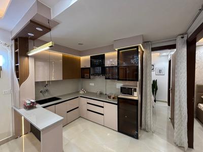 Kitchen Image of 1300 Sq.ft 4 BHK Apartment / Flat for sale in Hastsal New Delhi for Rs. 8000000