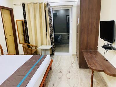Bedroom Image of Urbanroomz Coliving PG nearby Sector 32 in Sector 31, Gurgaon