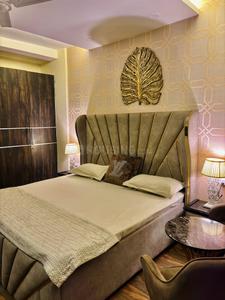 Bedroom Image of 400 Sq.ft 1 BHK Studio for rent in DLF Capital Greens Phase 1 And 2, Karampura New Delhi for Rs. 25000