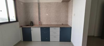 Kitchen Image of 935 Sq.ft 2 BHK Apartment / Flat for sale in Signature Vrajdham, Ujala Circle Ahmedabad for Rs. 3700000