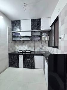 Kitchen Image of 988 Sq.ft 2 BHK Apartment / Flat for rent in Rama Krystal City, Moshi Pune for Rs. 18000