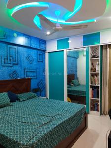 Bedroom Image of 1350 Sq.ft 3 BHK Apartment / Flat for sale in Krisna Nirmaan Amorapolis, Dhanori Pune for Rs. 9900000