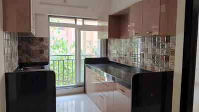 Kitchen Image of 480 Sq.ft 1 BHK Apartment / Flat for sale in Cosmos Enclave, Kasarvadavali Thane for Rs. 6700000