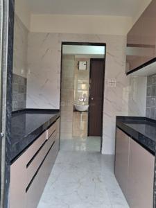 Kitchen Image of 1000 Sq.ft 1 BHK Apartment / Flat for rent in Taloja Navi Mumbai for Rs. 15000