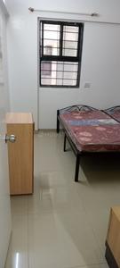 Bedroom Image of girls pg in Magarpatta City, Pune