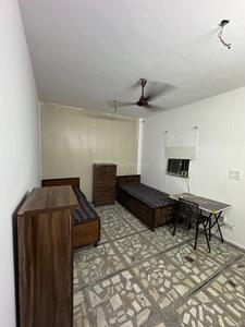 Bedroom Image of Hari Om PG in Kalkaji, New Delhi