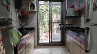 Kitchen Image of 1021 Sq.ft 3 BHK Apartment / Flat for sale in Vile Parle West Mumbai for Rs. 35000000