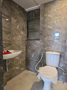 Common Bathroom Image of 875 Sq.ft 2 BHK Apartment / Flat for sale in Oxy Benicio Phase 1, Lohegaon Pune for Rs. 12376898