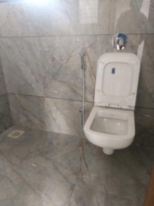 Common Bathroom Image of 1000 Sq.ft 2 BHK Apartment / Flat for sale in Kanifnath Archana Paradise, Mohammed Wadi Pune for Rs. 7450000