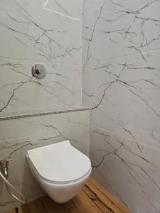 Common Bathroom Image of 1457 Sq.ft 2.5 BHK Apartment / Flat for sale in Shriram Divine Garden Phase II, Lohegaon Pune for Rs. 9458629