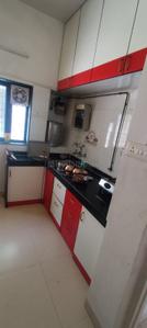 Kitchen Image of 650 Sq.ft 1 BHK Apartment / Flat for rent in Karan Bharti, Dhankawadi Pune for Rs. 15000
