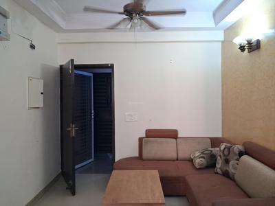 Living Room Image of 875 Sq.ft 1 BHK Apartment / Flat for rent in Amrapali Princely Estate, Sector 76 Noida for Rs. 15000