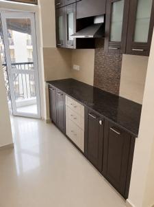 Kitchen Image of 1385 Sq.ft 3 BHK Apartment / Flat for sale in Prateek Wisteria, Sector 77 Noida for Rs. 18900000