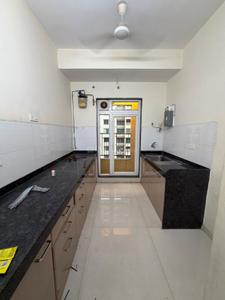 Kitchen Image of 620 Sq.ft 2 BHK Apartment / Flat for rent in Rustomjee Azziano, Thane West Thane for Rs. 44000