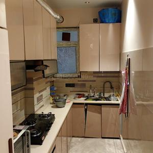 Kitchen Image of 950 Sq.ft 2 BHK Builder Floor for rent in  Maurya Enclave, Pitampura New Delhi for Rs. 35000