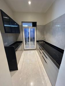 Kitchen Image of 650 Sq.ft 1 BHK Apartment / Flat for sale in Gajra Bhoomi Castle Phase I, Shilgaon Thane for Rs. 4500000