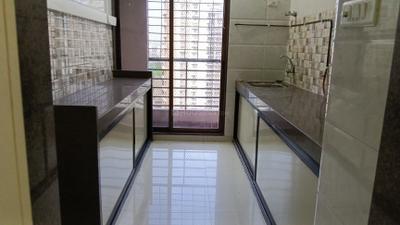 Kitchen Image of 1150 Sq.ft 2 BHK Apartment / Flat for sale in Gokuldham CHS, Kharghar Navi Mumbai for Rs. 11500000