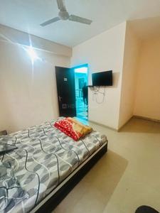 Bedroom Image of Kalra Hotel &amp; PG in Lohgarh, Zirakpur