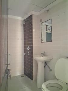 Common Bathroom Image of 949 Sq.ft 2 BHK Apartment / Flat for sale in Amrapali Zodiac by Amrapali Group, Sector 120 Noida for Rs. 8550000