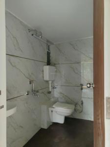 Common Bathroom Image of 620 Sq.ft 1 BHK Apartment / Flat for sale in KK Radha Nilaya, Bapane Mumbai for Rs. 3250000