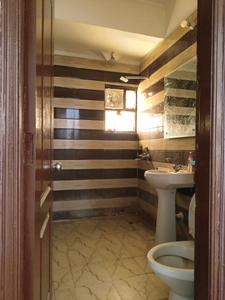 Common Bathroom One Image of 2300 Sq.ft 4 BHK Apartment / Flat for sale in Niho Jasmine Scottish Garden, Indirapuram Ghaziabad for Rs. 22500000