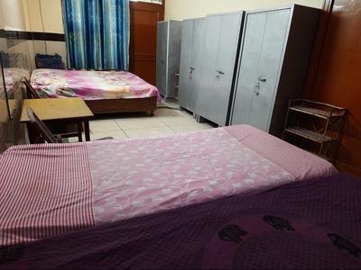 Bedroom Image of Kumkum PG in Sector 27, Noida